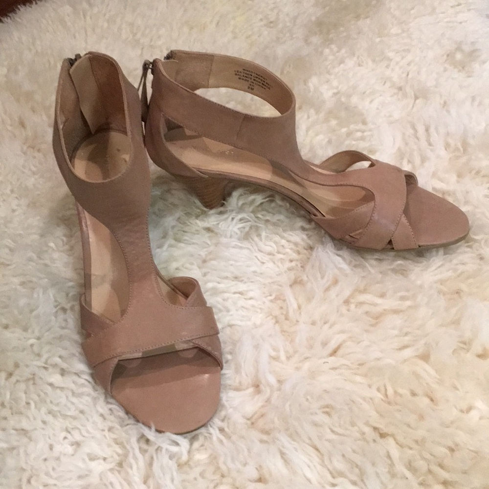 Ankle strap sandals with 2.5” heels.  Back zipper.